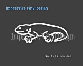 May include: White vinyl decal of a cartoon lizard, 3 inches wide and 1.2 inches tall. The decal says "Impressive Vinyl Design" in a stylized font.