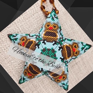 May include: A white ceramic mug with a black handle and the text "But first, coffee" in a handwritten style. The mug is on a white surface. The mug is 4 inches tall.