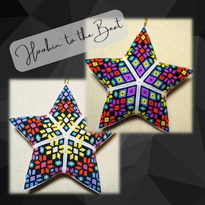 May include: Two colorful star-shaped ornaments with a geometric pattern of black, white, red, orange, yellow, blue, and purple. The ornaments are made of beads and have a loop at the top for hanging.