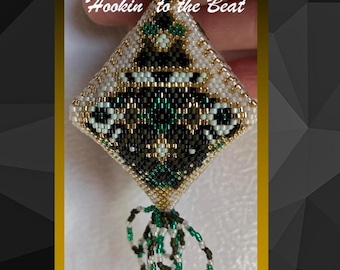 May include: A white, black, and green beaded ornament with a tassel. The ornament is shaped like a diamond and has a geometric pattern. The text "Hookin' to the Beat" is visible in the image.
