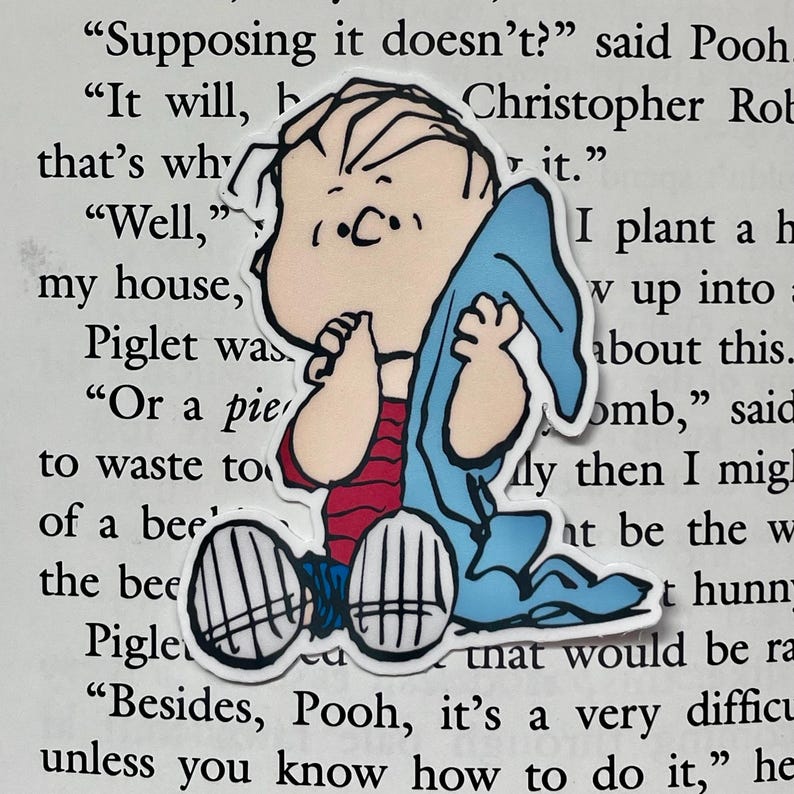 May include: A cartoon sticker of a young boy with brown hair wearing a red and white striped shirt, blue jeans, and a light blue blanket. The boy is sitting with his hands clasped in front of his face. The sticker is on a page of a book with text that reads "Supposing it doesn't?" said Pooh "It will, b that's why "Well," my house, Piglet was "Or a pie to waste to of a bee' the bee Pigle Christopher Rob it." I plant a h v up into about this. omb," said My then I mig at be the w t hunn that would be ra "Besides, Pooh, it's a very difficu unless you know how to do it," he