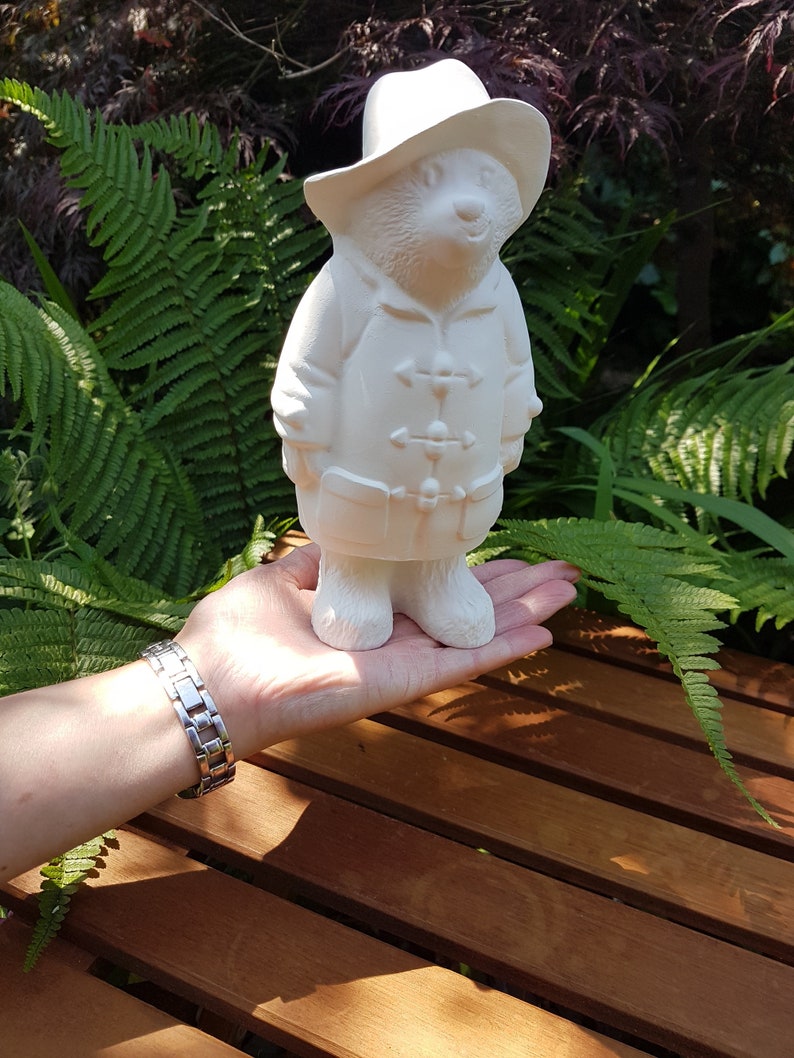 Officially licensed Paddington Bear ceramic figure in hand for scale