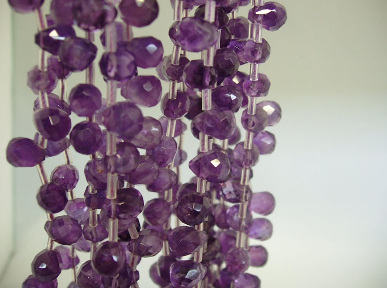 sku#279 Faceted Teardrop Briolette 8x9x12mm A Quality 34 pieces per strand 17 pieces half strand Special Find by Energy Stone