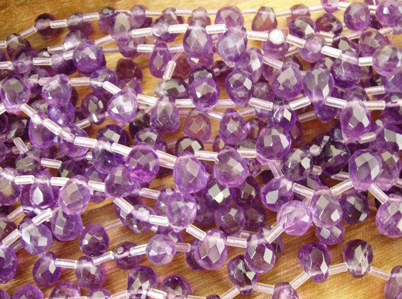 sku#279 Faceted Teardrop Briolette 8x9x12mm A Quality 34 pieces per strand 17 pieces half strand Special Find by Energy Stone