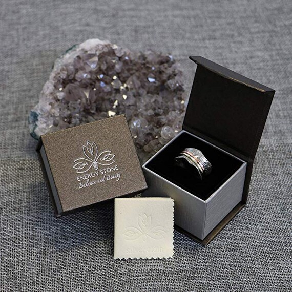 energy stone spinner rings