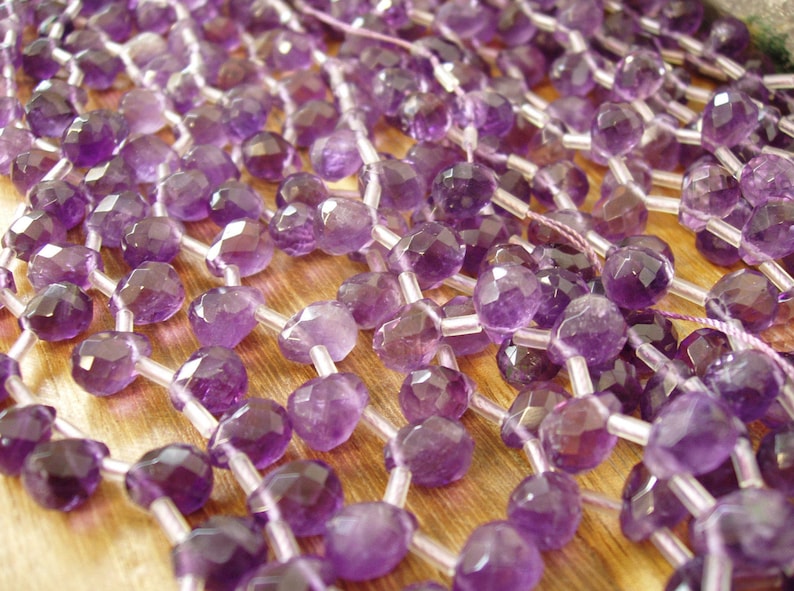 sku#279 Faceted Teardrop Briolette 8x9x12mm A Quality 34 pieces per strand 17 pieces half strand Special Find by Energy Stone