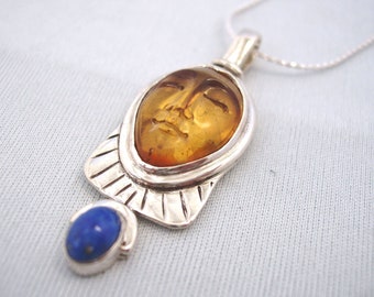 Carved Amber Goddess & Oval Lapis Lazuli Sterling Silver Pendant 43x16mm Including Bail by Energy Stone (sku#1062)