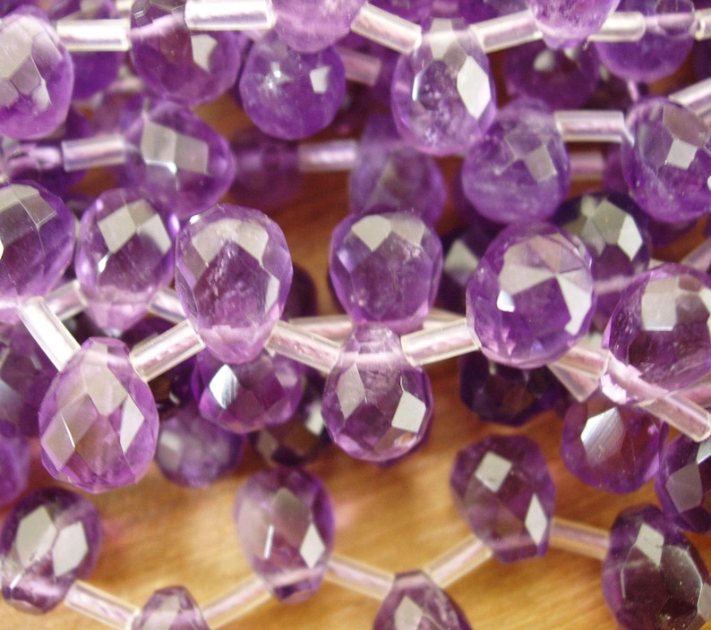 sku#279 Faceted Teardrop Briolette 8x9x12mm A Quality 34 pieces per strand 17 pieces half strand Special Find by Energy Stone