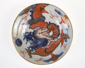 Antique 18th century Chinese blue and white and iron-red small porcelain dragon dish