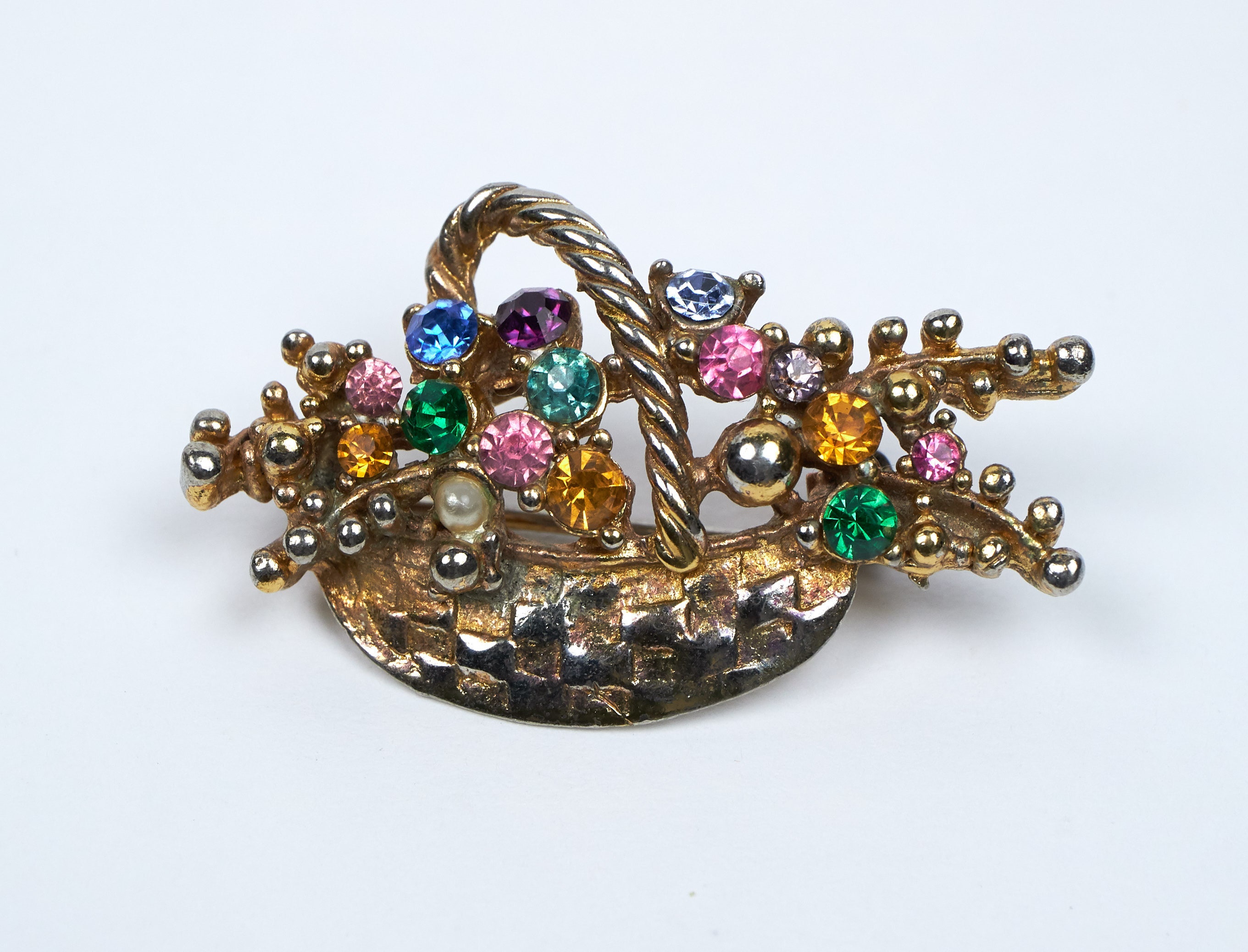 Vintage rhinestone and gilt metal brooch in the form of a basket of colourful flowers