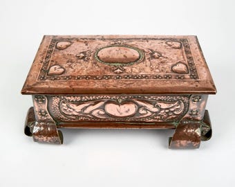 Antique 1900s Arts and Crafts repousse hearts copper jewellery casket box.