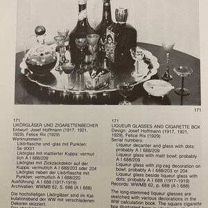 May include: A set of clear glass liquor glasses and a square cigarette box with a black and white design. The glasses have long stems and various decorations. The box is labeled with the text "KW 1679/1".