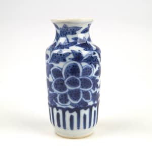 Antique 19th or early 20th century Chinese miniature blue and white floral porcelain vase.