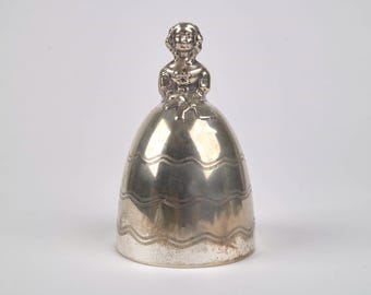 Amusing 1920s Art Deco silver plate crinoline lady legs clapper table bell. Worn plate.