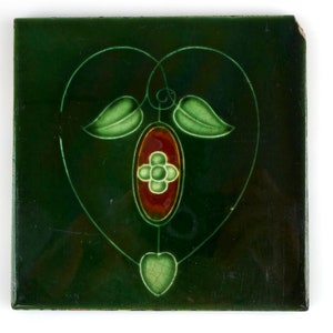 Antique 1900s Lea and Boulton Art Nouveau green heart pottery tile.