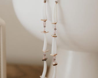 Pendientes de cuentas moradas de fabricación nativa de Dentalium