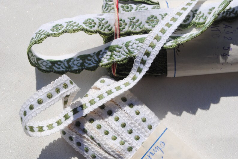 vintage 1960s olive green woven dots and flowers woven picot border on white all cotton lip trims edgings 2 bolts 10 meters each