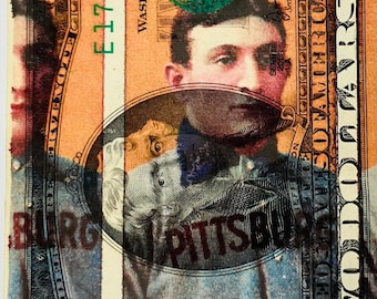 May include: A two-dollar bill with a portrait of a man, featuring the text "TWO DOLLARS" and "WASHINGTON, D.C.". The bill has a serial number and the words "WAGNER, PITTSBURG" are visible.