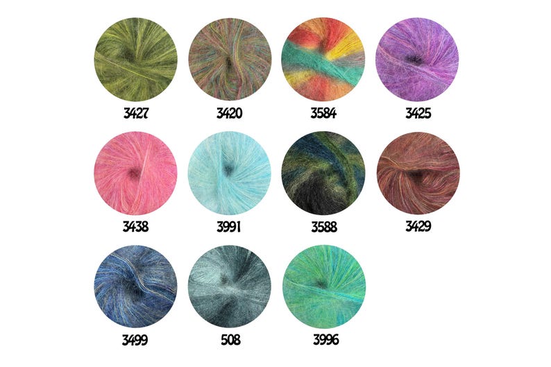 May include: Eleven circular skeins of fuzzy yarn in various colors labeled with numbers 3427, 3420, 3584, 3425, 3438, 3991, 3588, 3429, 3499, 508, and 3996. The yarn displays a soft, brushed texture with solid, variegated, and blended color patterns.