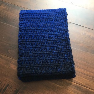 Beautiful crocheted infinity scarf in royal and black.