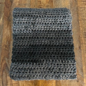 Hand crocheted scarf in gray and black.