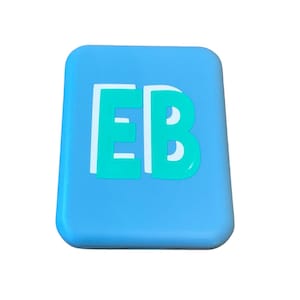 May include: A blue silicone case with the letters "EB" in white and green.