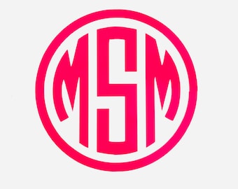 May include: A pink monogram sticker with the letters "MSM" in a circle.