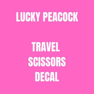 May include: Pink background with white text that reads "LUCKY PEACOCK TRAVEL SCISSORS DECAL".