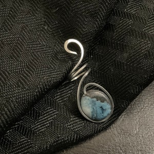 Stainless steel and matte sodalite