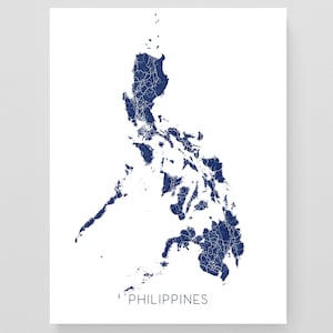 May include: A minimalist print of the Philippines, featuring a navy blue map of the islands against a white background. The map highlights the country's shape and internal divisions. The word "PHILIPPINES" is printed in a simple font below the map.