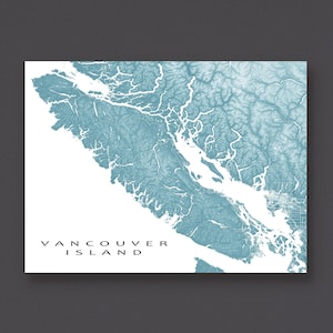 May include: A map of Vancouver Island in shades of blue and white, with the island's shape and topography detailed. The text "VANCOUVER ISLAND" is printed in black at the bottom of the image. The map is set against a dark gray background.