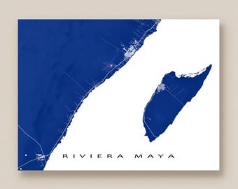 May include: A minimalist map print of Riviera Maya, featuring a deep blue coastal outline against a white background. The print includes the text "RIVIERA MAYA" in a simple, sans-serif font. The map highlights the region's coastline and infrastructure.