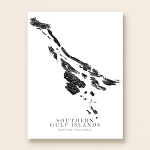 May include: A black and white map print of the Southern Gulf Islands in British Columbia. The map shows the islands' outlines in black against a white background. The text "SOUTHERN GULF ISLANDS BRITISH COLUMBIA" is printed at the bottom.