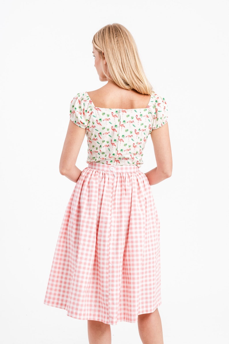 Cosy pink top with brown checkered skirt (047)