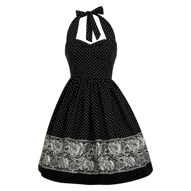 May include: A black halter-style dress featuring a white polka dot pattern throughout the bodice and skirt. The hemline is accented with a wide, intricate white floral lace border, and the neckline includes a tie closure at the back of the neck.