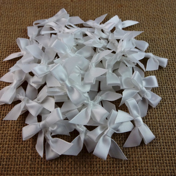 Small White Satin Bows 1 And 3/8th Inches wide.  Fifty Bows For Scrapbooking, Wedding Favors And Cardmaking Embellishments.