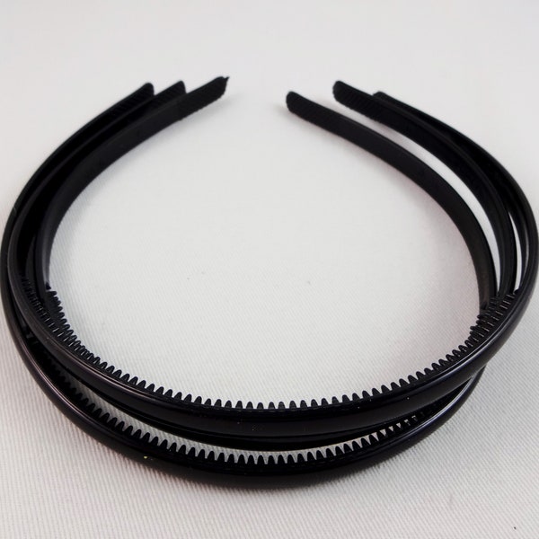 Thin black headbands flexible plastic, set of 3.  One quarter inch wide headbands to use for DIY hair accessory projects.