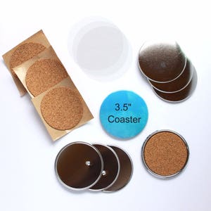 May include: An assortment of coasters, including cork, clear, and metallic silver designs. One coaster is labeled "3.5" Coaster" on a blue background. The coasters are round and come in various quantities, suitable for home or office use.