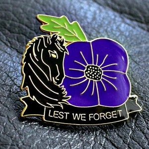 Great purple poppy pin badge animals in war - dead horses Remembrance day 2024