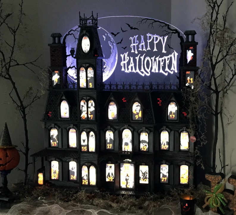 This Halloween Advent Calendar house is hand crafted. It's a spooky Victorian mansion that's sure to amaze you. image 4