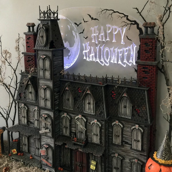 This Halloween Advent Calendar house is hand crafted.  It's a  spooky Victorian mansion that's sure to amaze you.