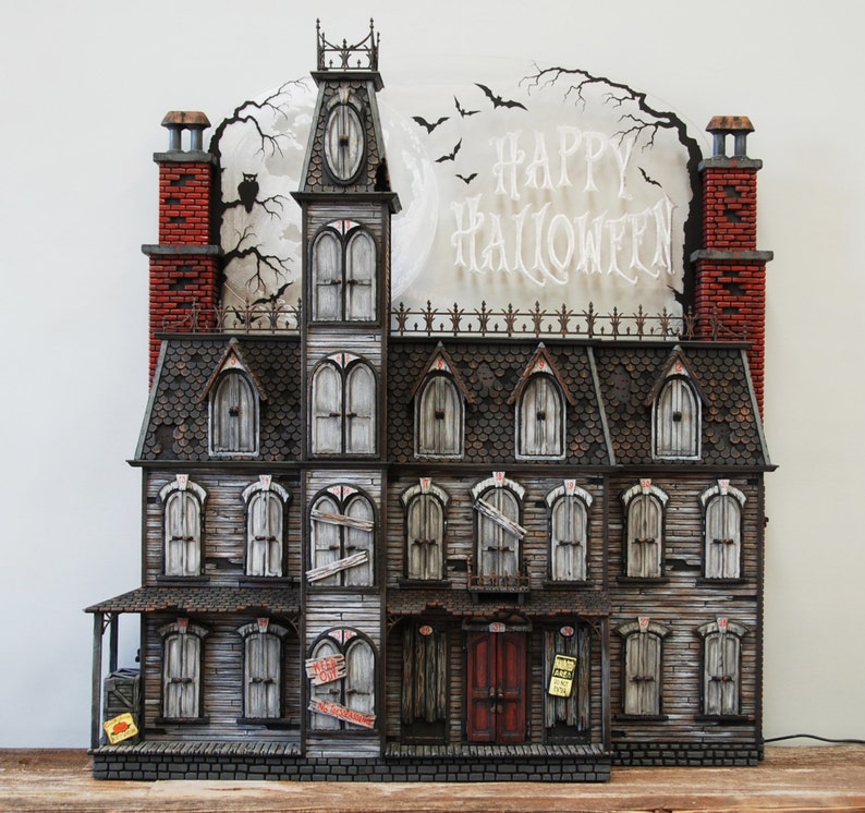 This Halloween Advent Calendar house is hand crafted. It's a spooky Victorian mansion that's sure to amaze you. image 2