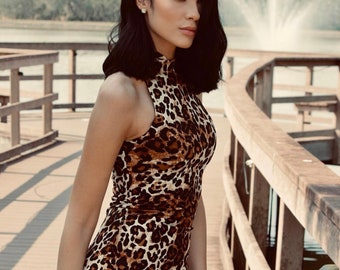 cheetah bodycon dress Print Midi print fabric is stretchy and hugs your figure well Alivia Leopard Beaded Mini Dress