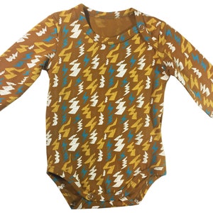 Body de bebé con diseño de rayos