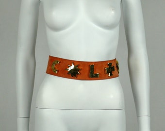Gorgeous vintage peach suede wide belt embellished with iconic symbols Christian Lacroix