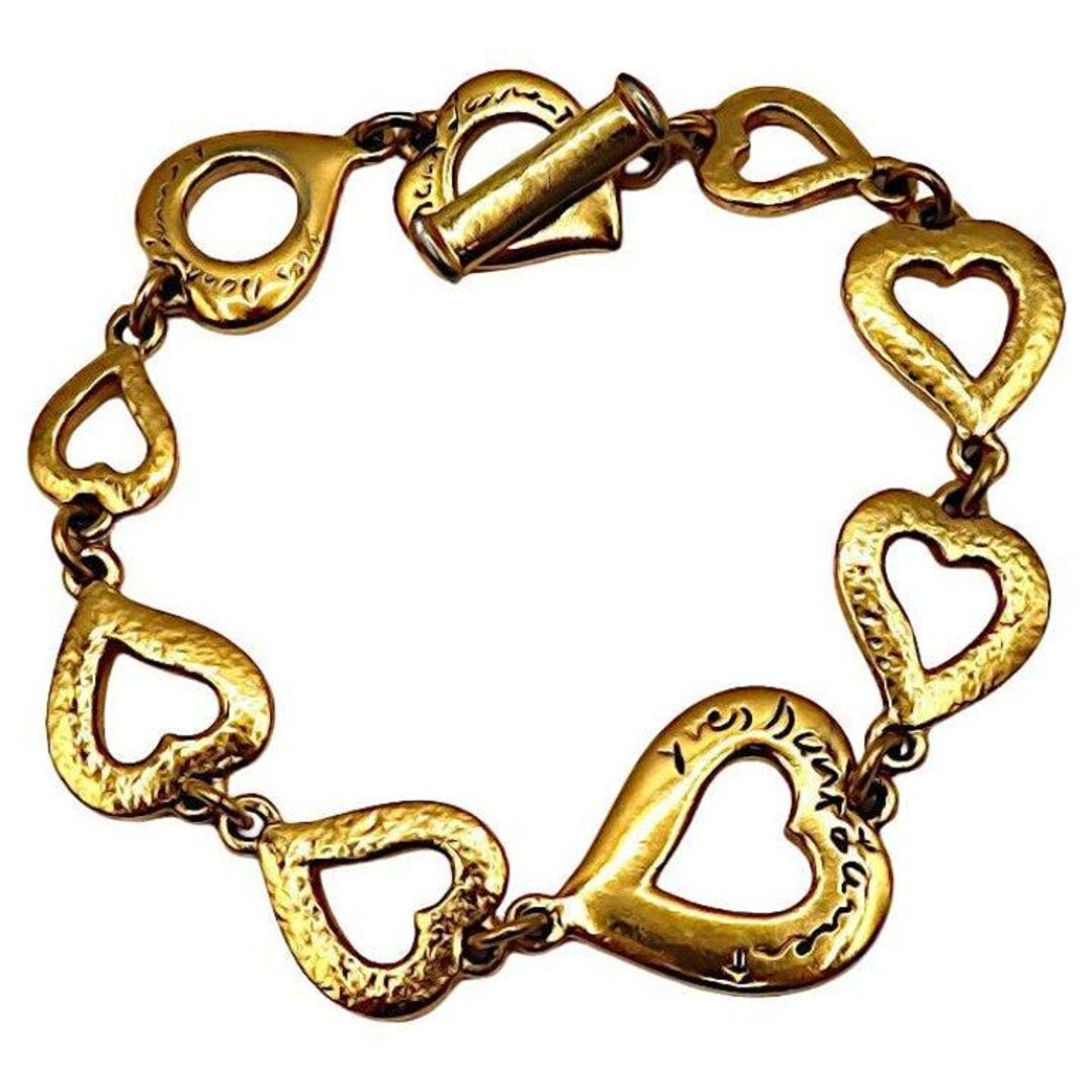 Yves Saint Laurent ハート型ブレスレット CASSANDRE heart charm bracelet in metal and rhinestone