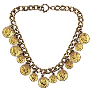 MOSCHINO * Collar de metal dorado vintage Encantos de efigie de Franco Moschino