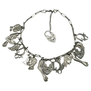 CHRISTIAN DIOR * Vintage Silver Tone Figural Charm Necklace