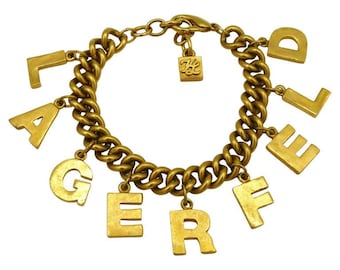 KARL LAGEFERLD * Pulsera de cadena con placa de identificación de metal dorado vintage
