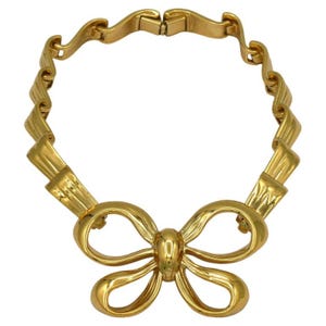 YVES SAINT LAURENT * Vintage Gold Tone Bow Ribbon Choker Necklace